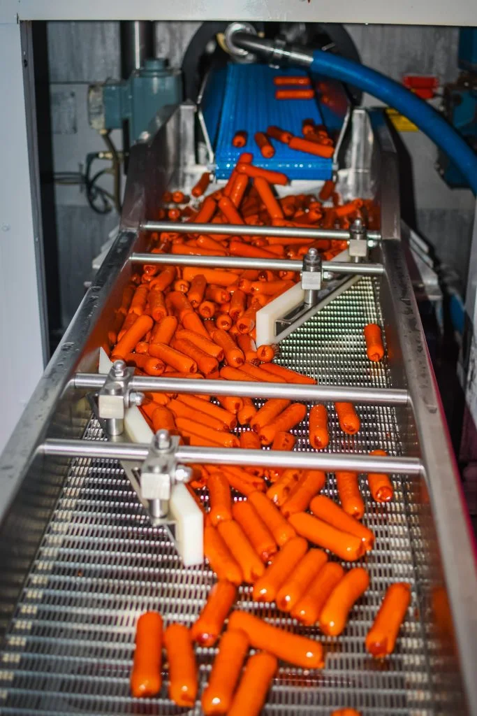 Kenchic's thika processing plant achieves fssc 22000 2018 v 5. 1- 2022 certification The kenchic smoked sausage goes through the processing belt at the thika processing plant