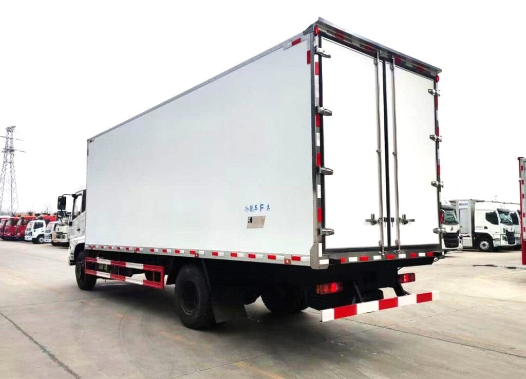 A refrigerated truck delivering farm produce