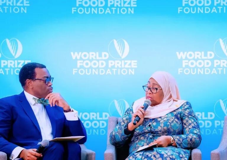 Dr Akinwumi Adesina left and President Samia Suhulu Hassan of Tanzania discuss bold measures to feed Africa during the World Food Prize Norman E Borlaug Dialogue. Iowa October 2024