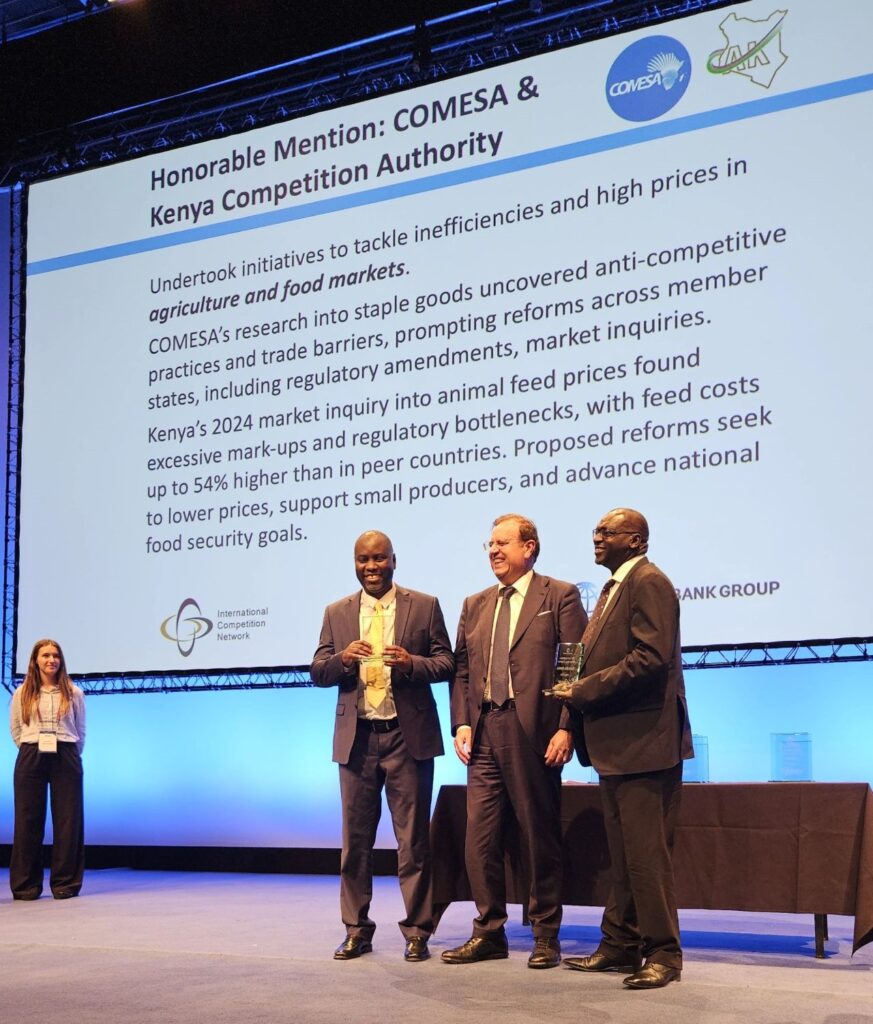 COMESA Competition Commission Recognised for Tackling Food Inefficiencies The COMESA Competition Commission Director and Chief Executive Officer Dr Willard Mwemba left and the Competition Authority of Kenya Director General Mr. David Kemei receiving the award