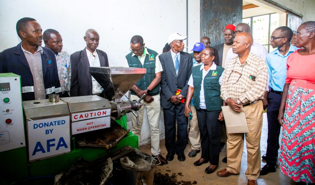 Cotton farmers in busia benefit from new seed milling machine Handing over of the cotton seed milling machine