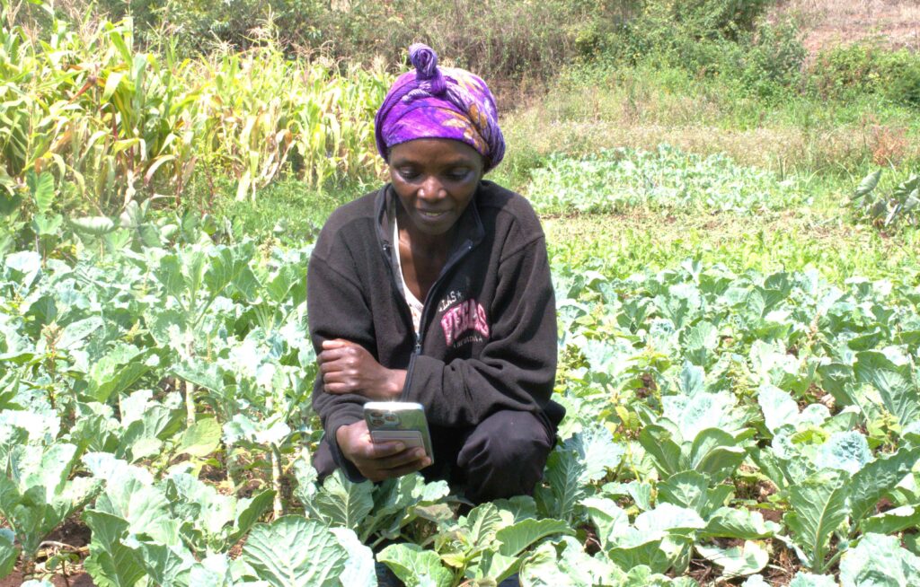 Susan nduta at her farm in kerarapon