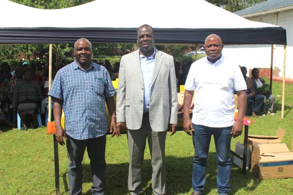 Cabinet Secretary for Cooperatives and MSMEs Development Wycliffe Oparanya with two others